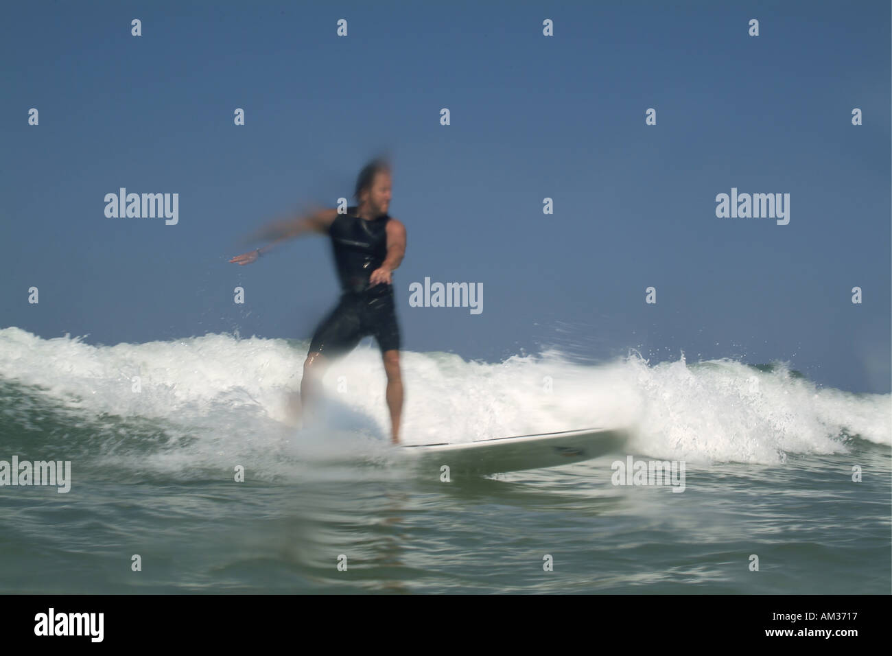 Man surfing waves at Le beach, Bordeaux, France Stock Photo Alamy
