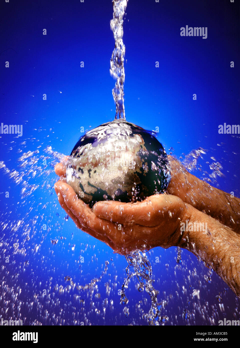 hands holding globe with pouring water hand holding globe with water