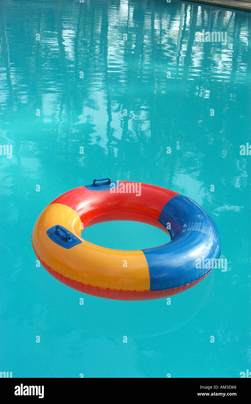 Rubber ring floating in a swimming pool Stock Photo - Alamy