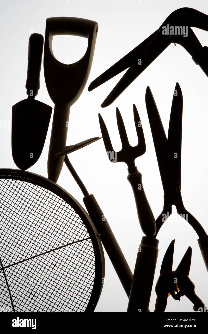 Gardening Tools against shed Window Stock Photo