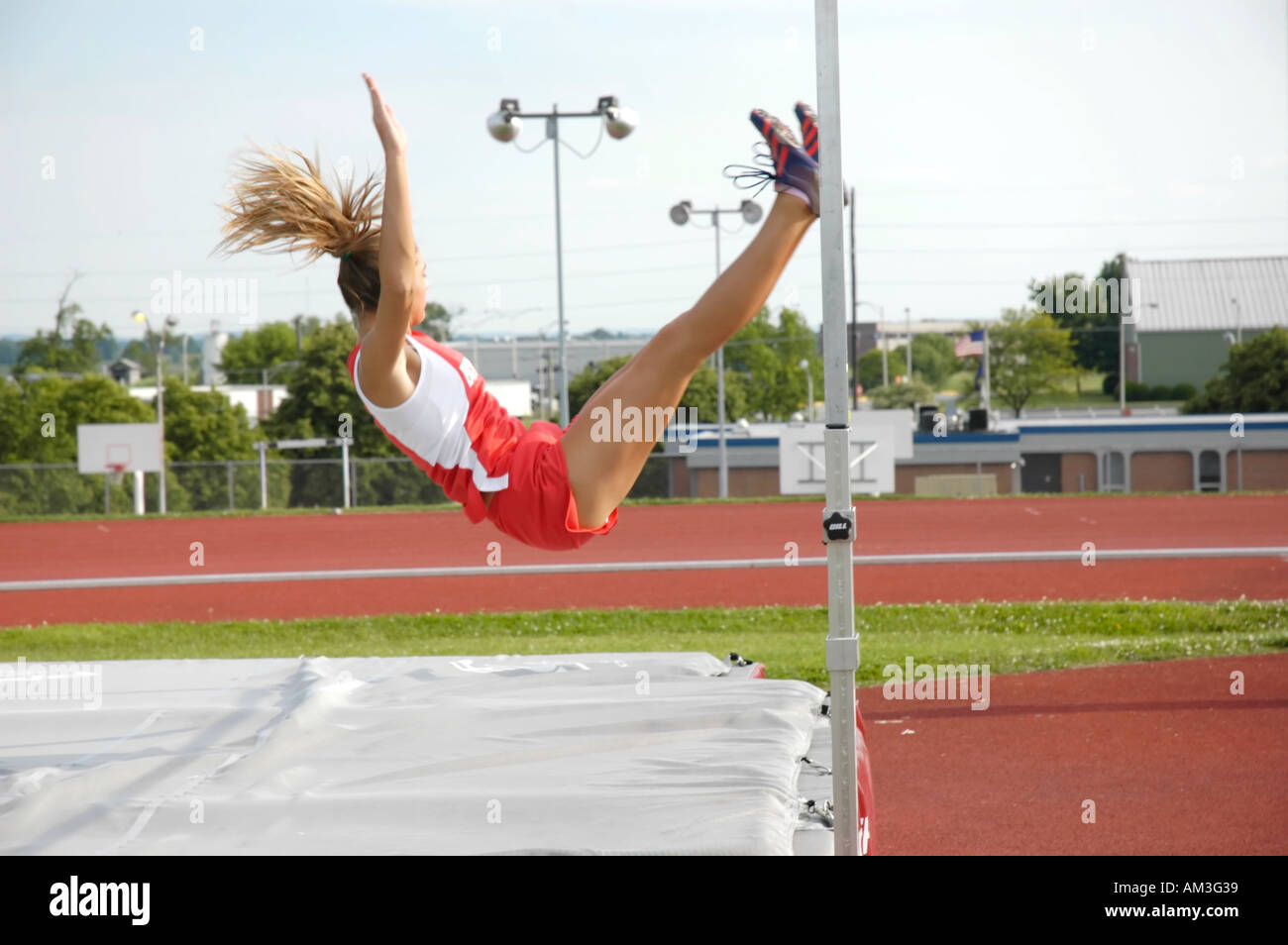 Track And Field Competition High Jumper Stock Photos & Track And Field