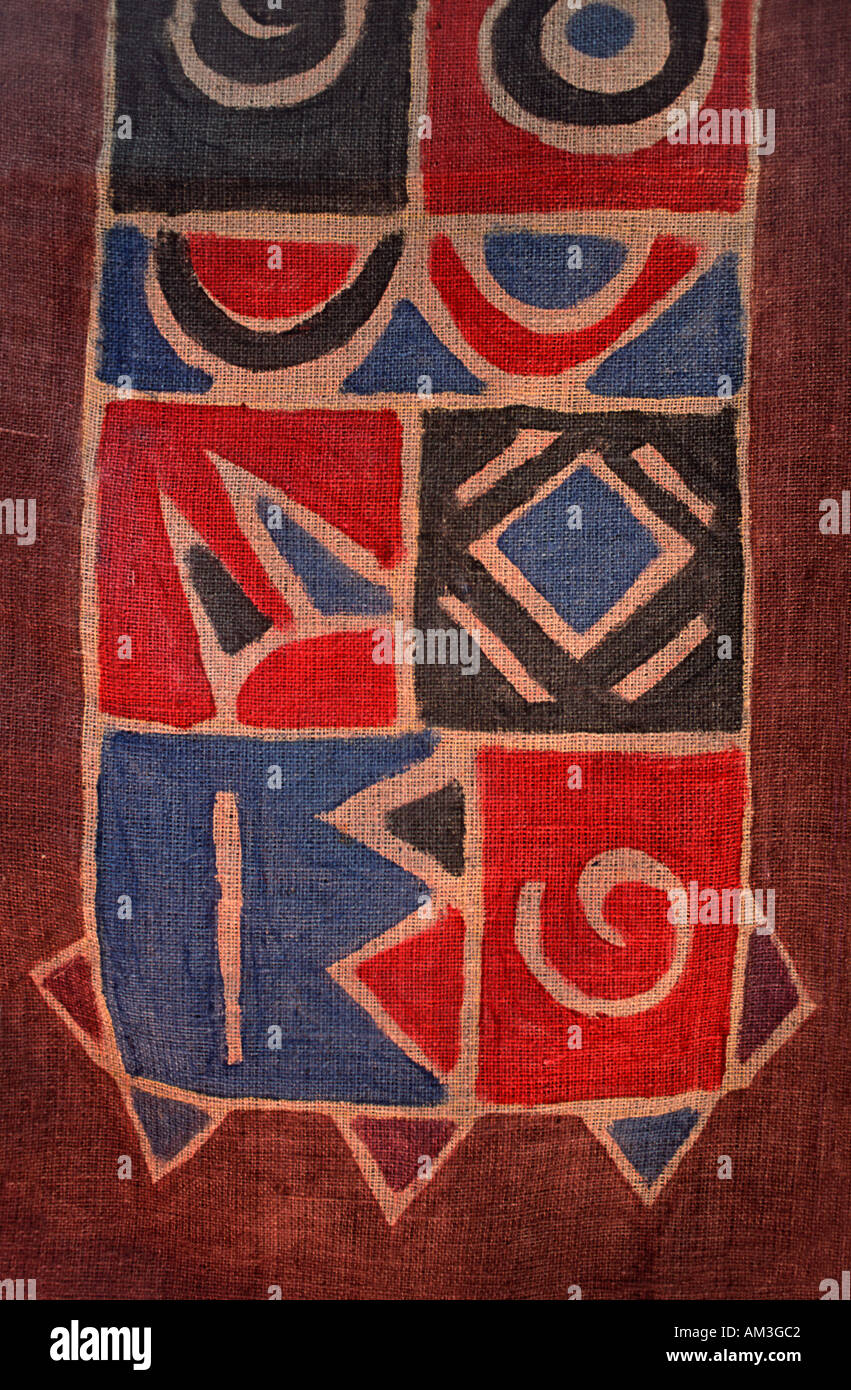 Colourful geometric fabric batik like patterning on hessian For sale in Stone Town Zanzibar Stock Photo