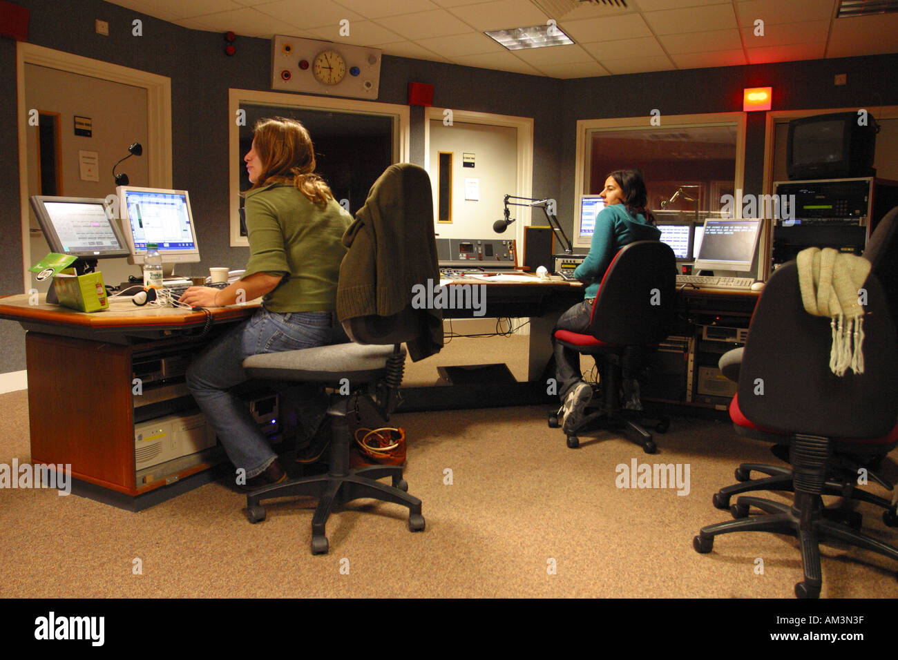 BBC Live radio studio producer and assistant at work Stock Photo