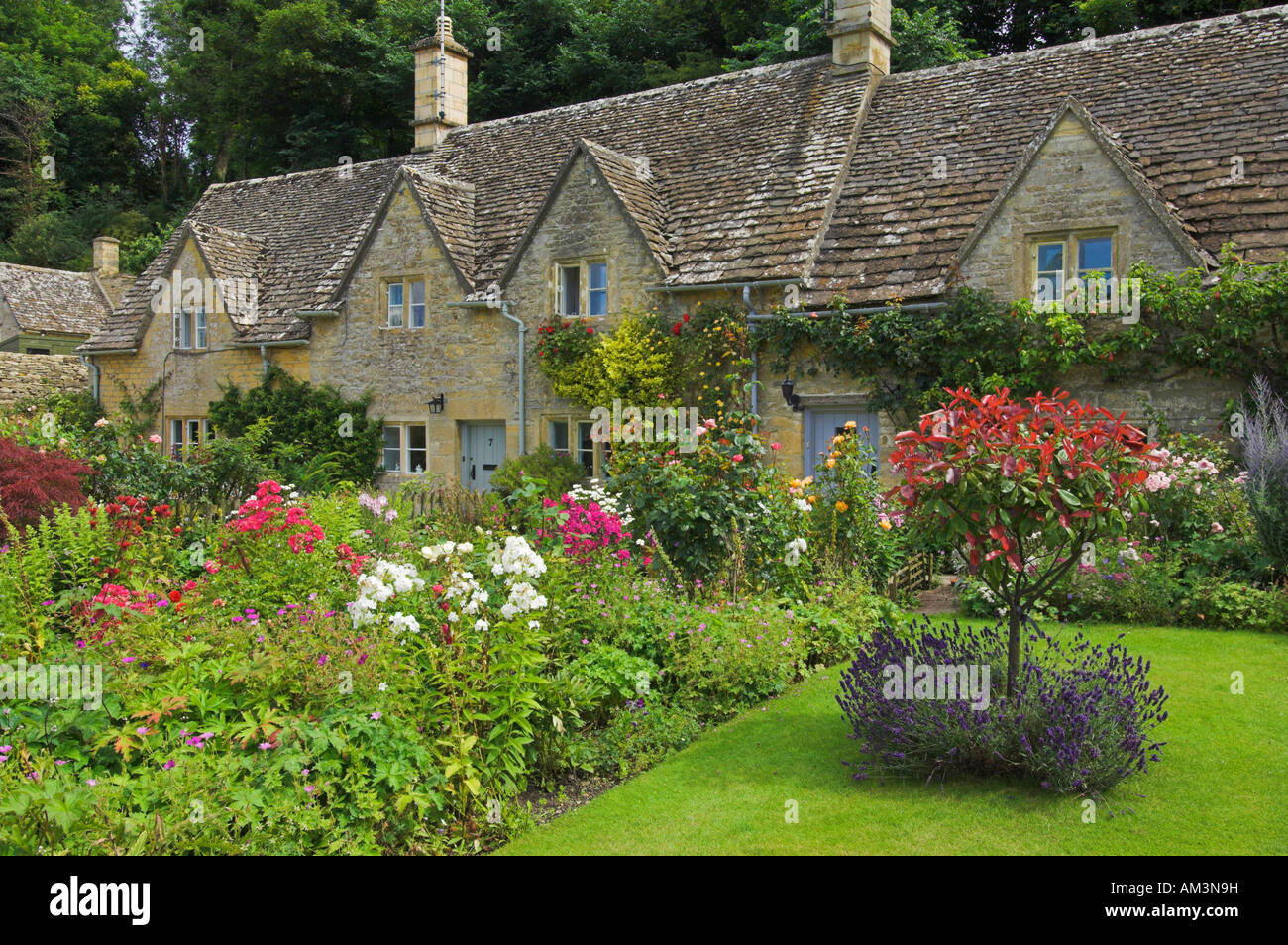 Quaint old Cotswold cottages Bibury England UK GB EU Europe Stock Photo