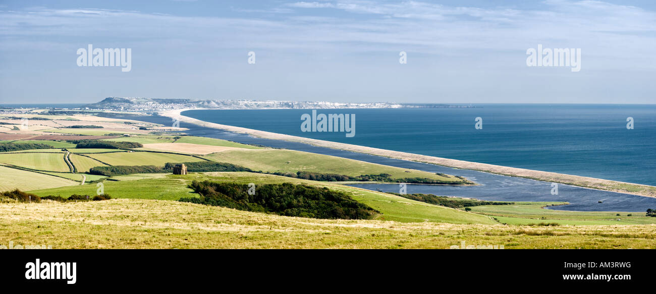 Chesil Beach Dorset UK - looking over St Catherines chapel towards the Isle of Portland and Chiswell Stock Photo