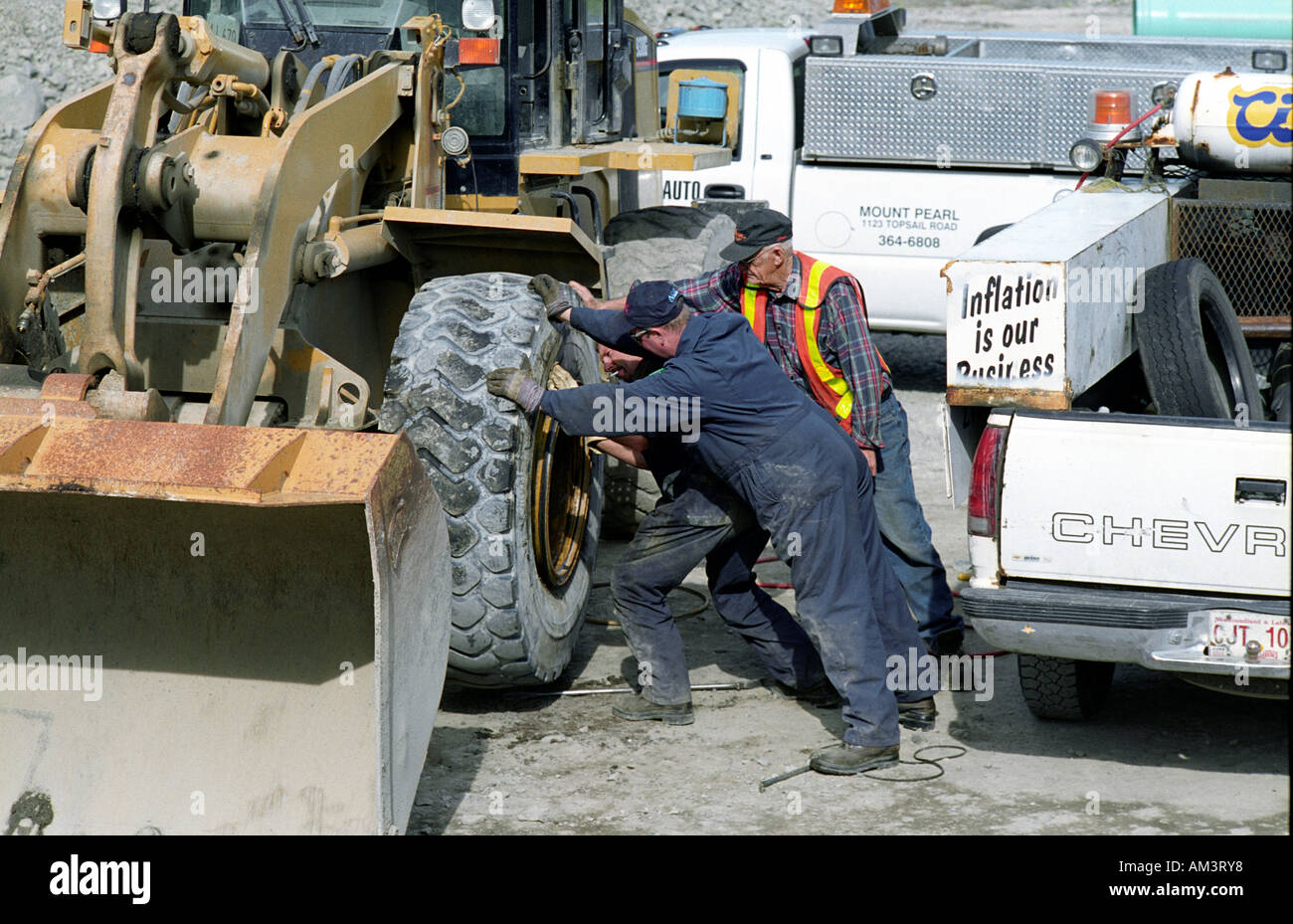 CANADA ST JOHNS NEWFOUNDLAND HARD WORKING MEN REPLACE TYRE TIRE 2006