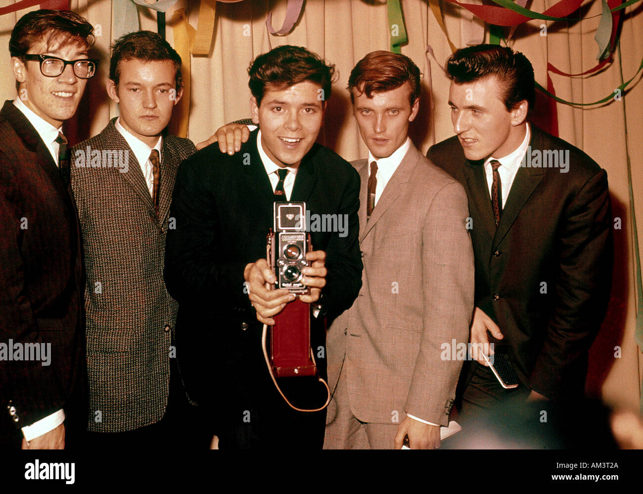 CLIFF RICHARD English pop singer with his band The Shadows at his birthday party in 1961. For names see Description below. Stock Photo