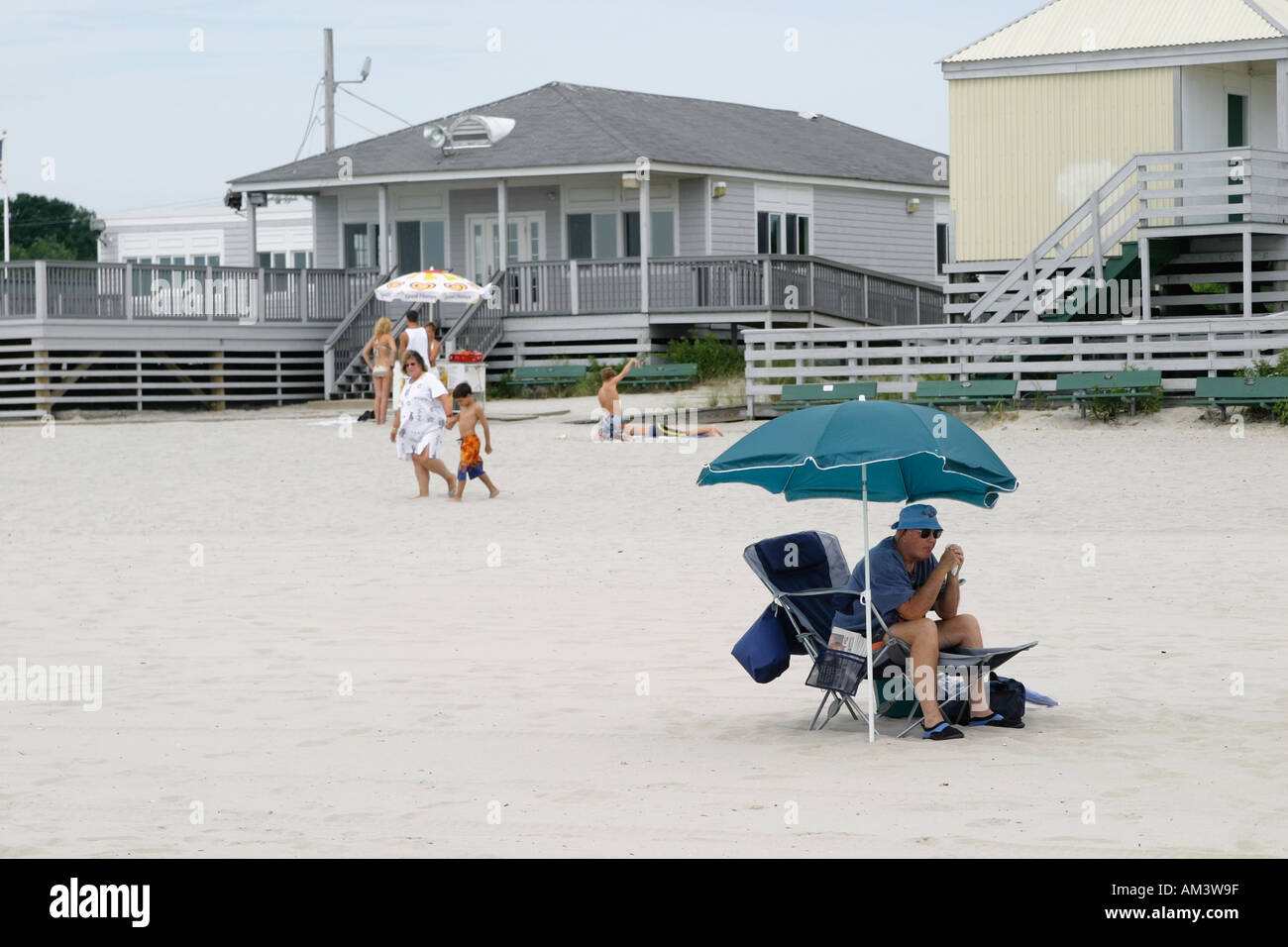 Lonely man on beach Stock Photo