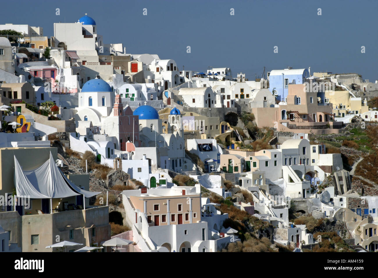 Classic Greek blue domed church roofs on the popular tourist Greek ...