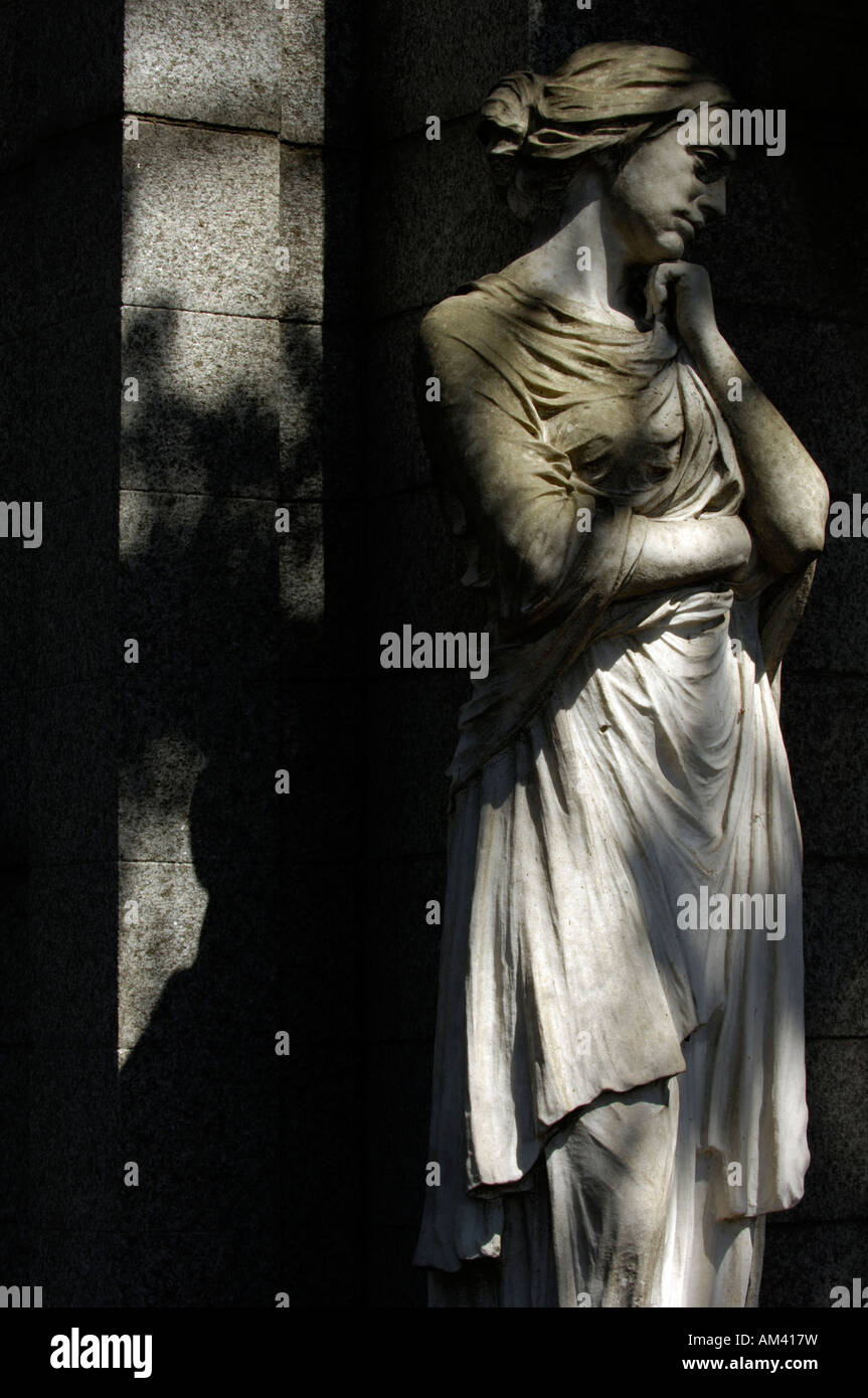 A statue of a grieving woman in Recoleta Cemetery, Buenos Aires Stock Photo