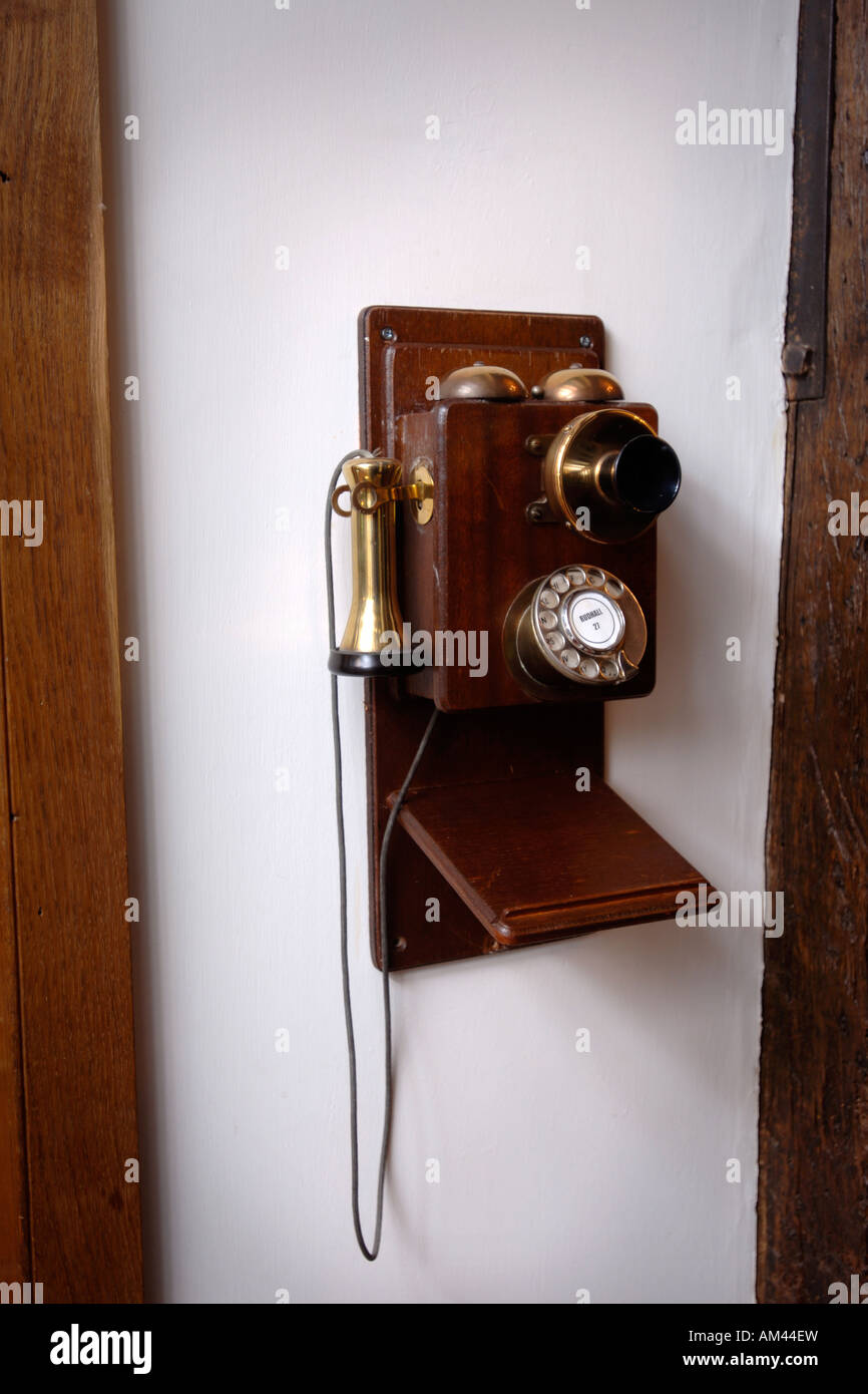 AN ANTIQUE WALL TELEPHONE UK Stock Photo