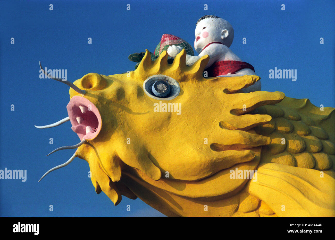 Boy riding a fish sculpture hi-res stock photography and images - Alamy