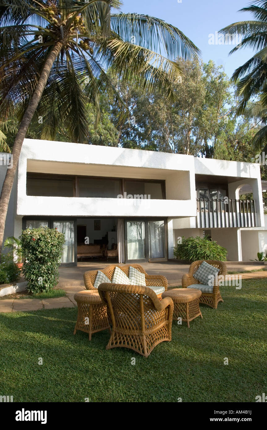 Armchair and a couch in a lawn Stock Photo Alamy