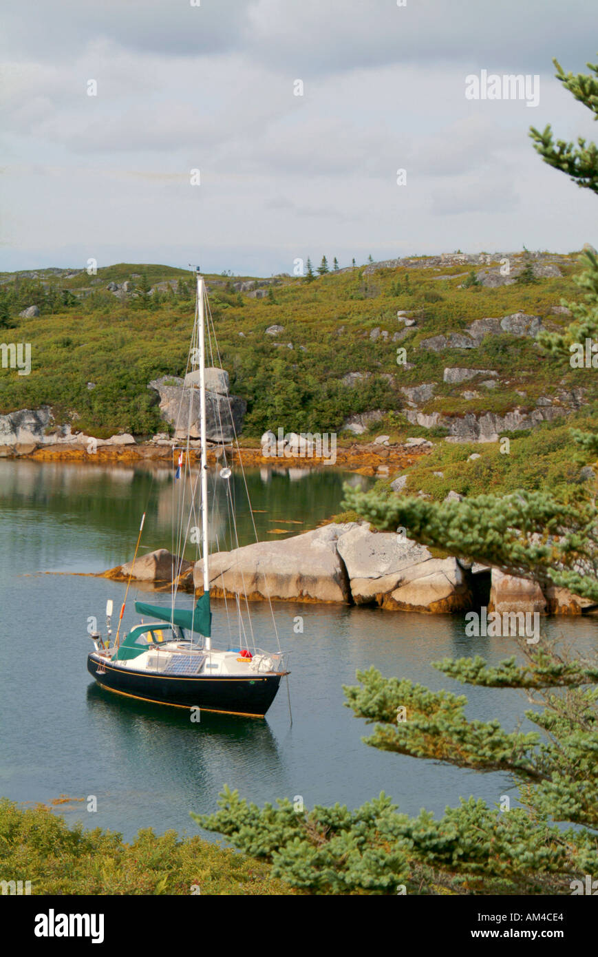 cruising sailboat at anchor in Rogues Roost, Nova Scotia Stock Photo