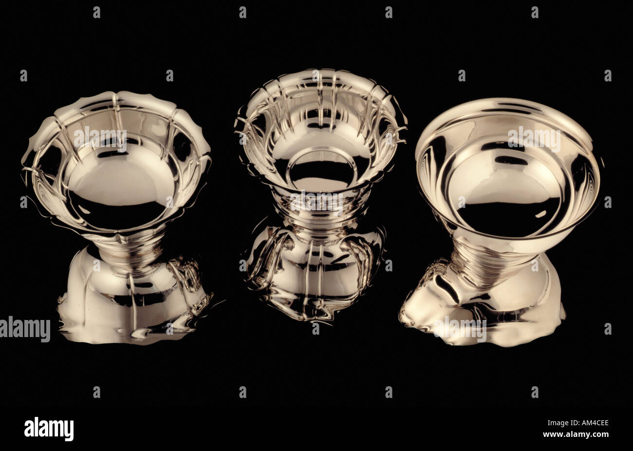 silver award bowls on a black background Stock Photo
