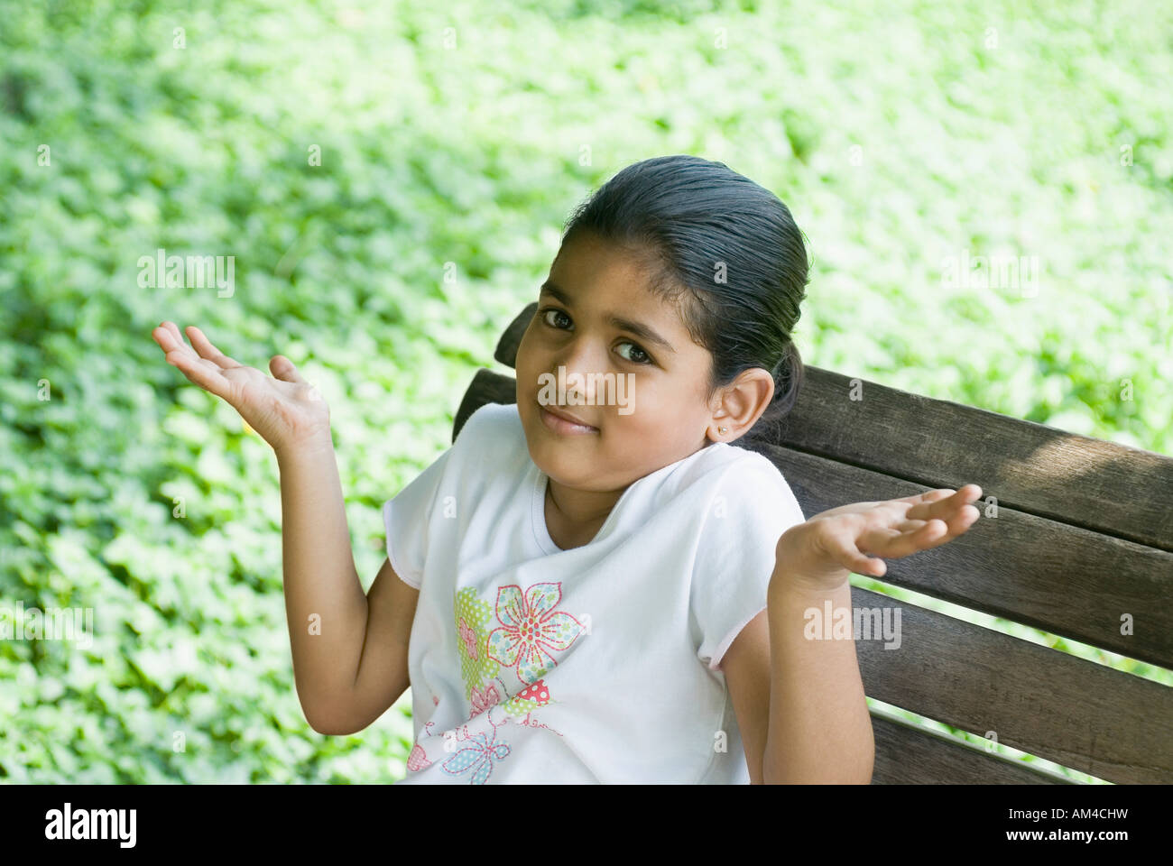 Indian girl sitting on bench hi-res stock photography and images - Alamy