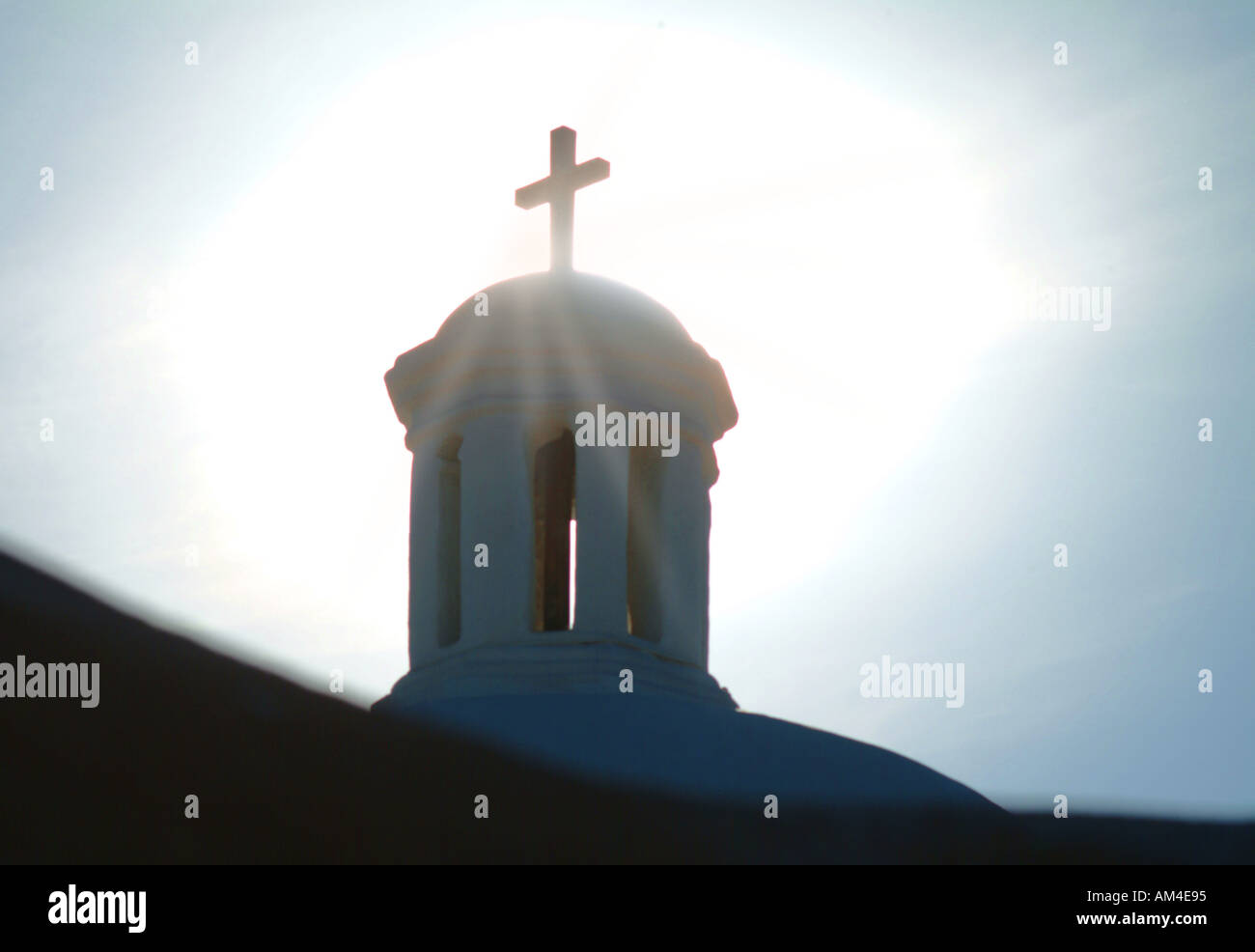 Crucifix atop a church steeple Stock Photo