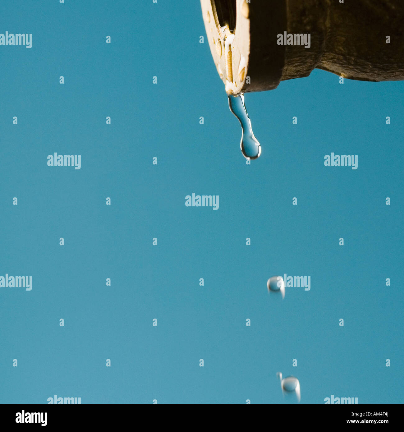 Water dripping from a faucet Stock Photo Alamy