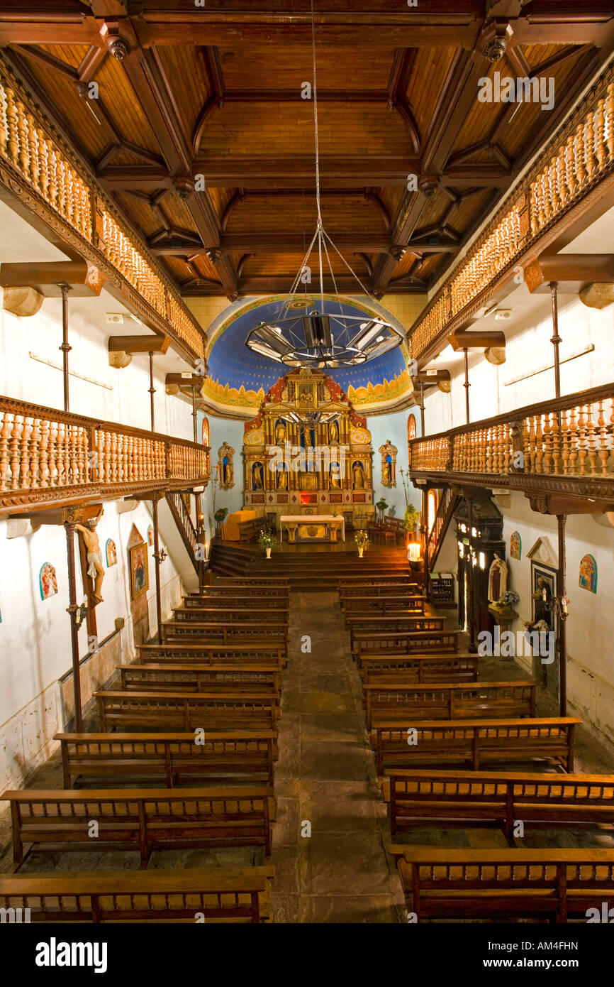 The inside of the small Aïnhoa's Basque church (France). Intérieur de ...