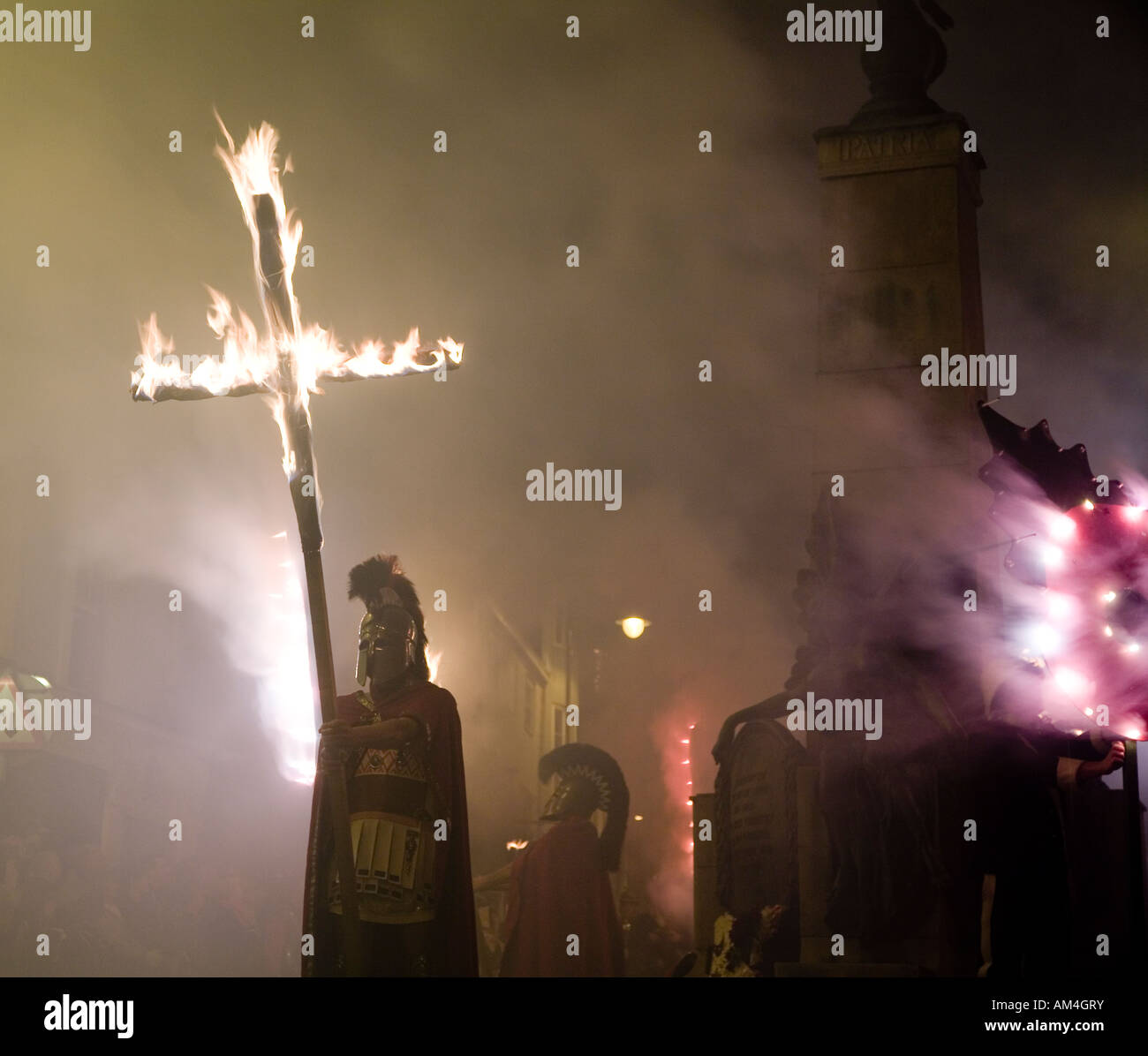 Roman Soldier And Burning Cross At the Lewes Fire Festival Sussex UK Europe Stock Photo