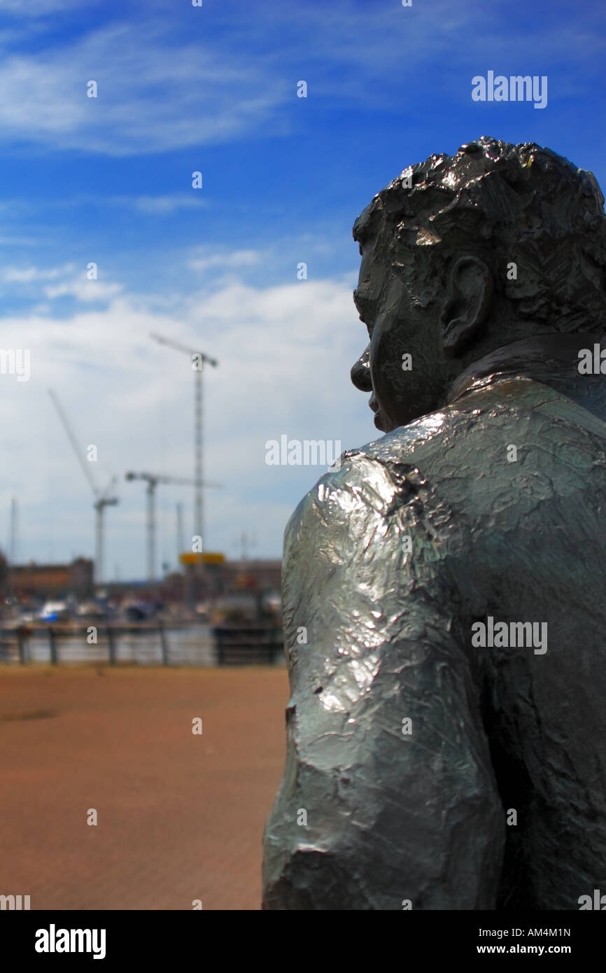 The statue of Dylan Thomas looks out over Swansea Marina to the new ...