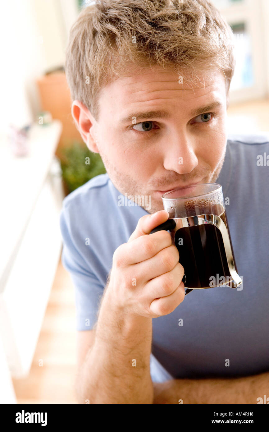 man drinking black coffee Stock Photo