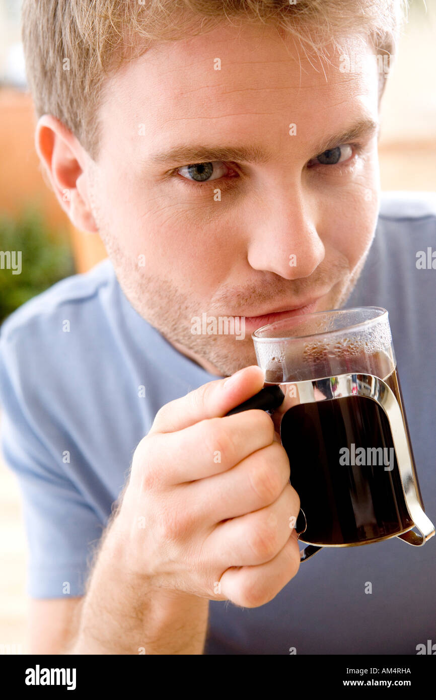 man drinking black coffee Stock Photo