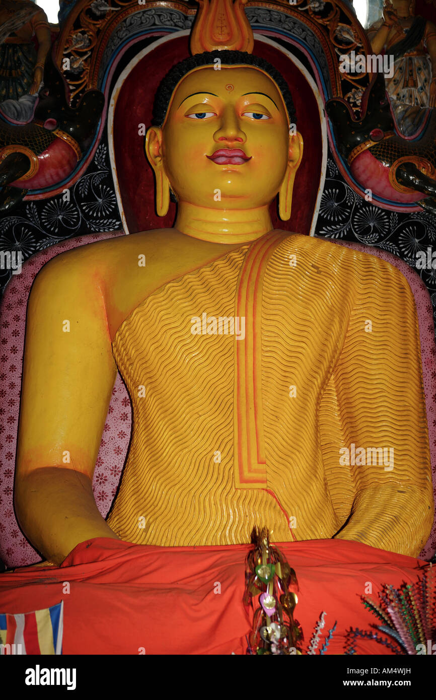 A sitting buddha in a temple in Sri Lanka Stock Photo