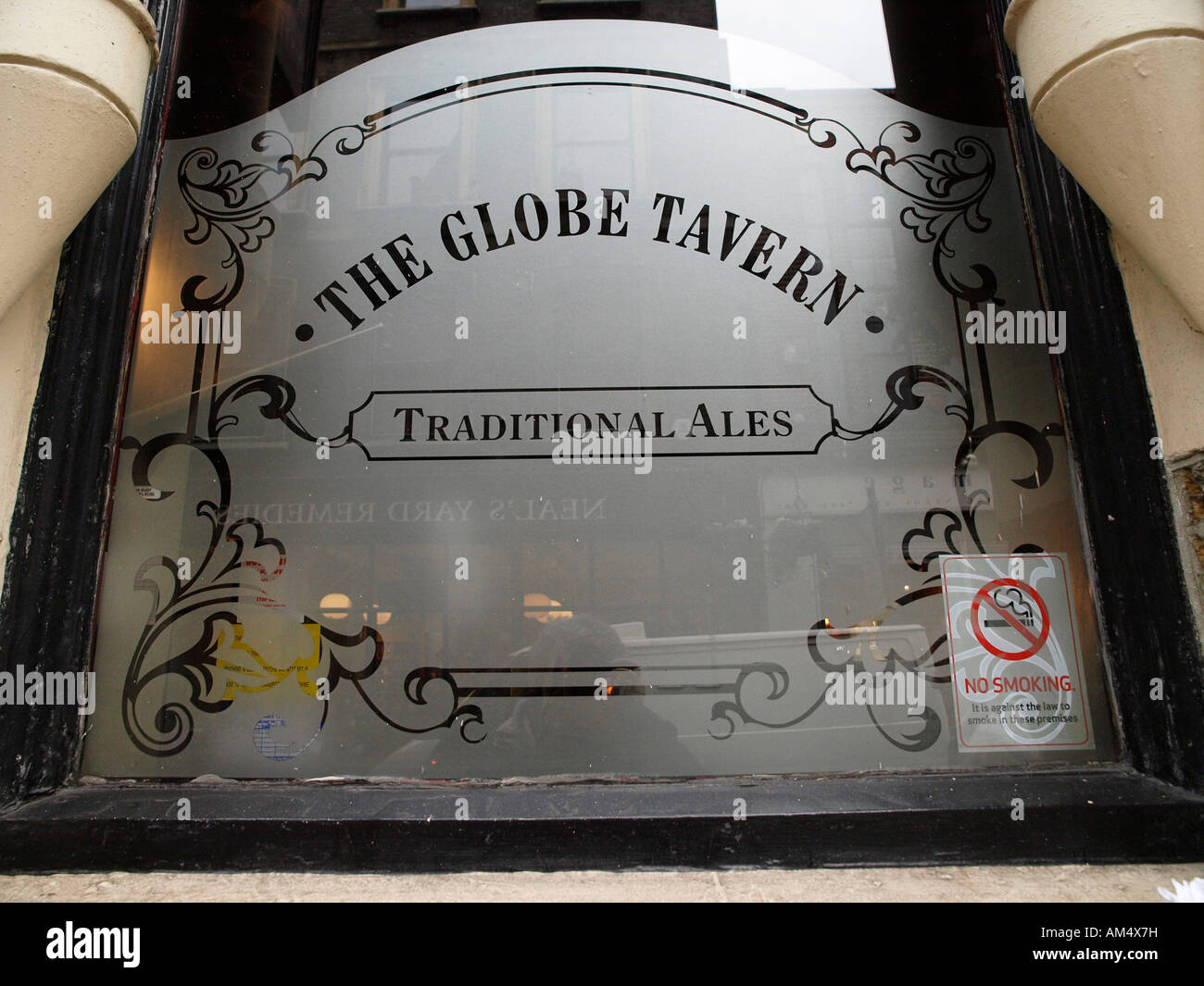 Etched glass window of the Globe Tavern with statutory No Smoking Sign, Borough Market Southwark London SE1 Stock Photo