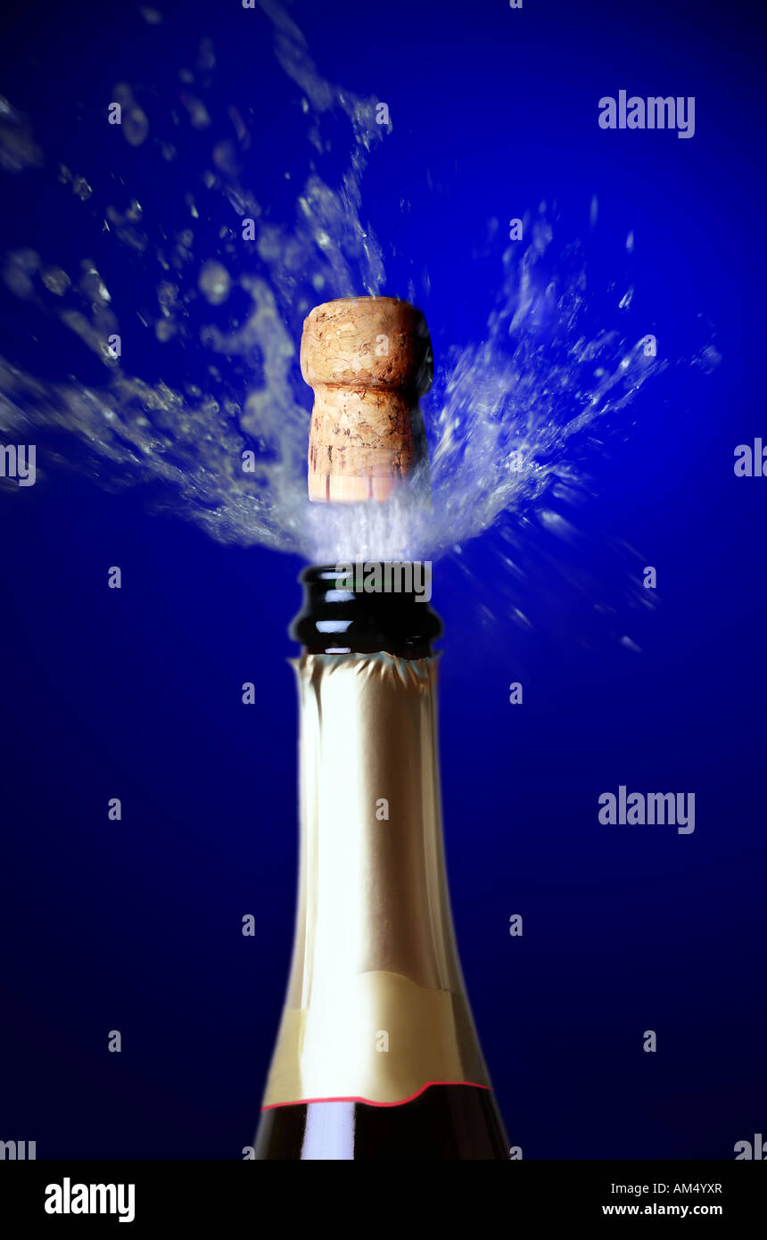 Close up of champagne cork popping Stock Photo Alamy