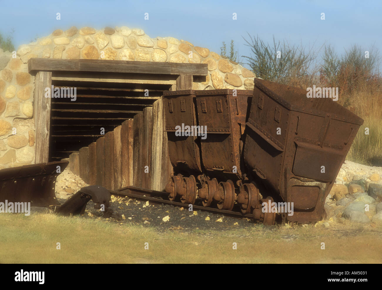 Old Mining Cars just outside a mine Stock Photo