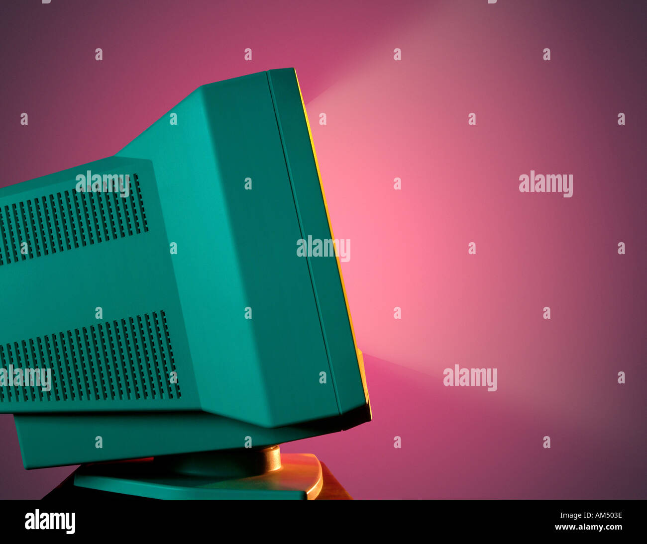 computer monitor glowing brightly. Stock Photo