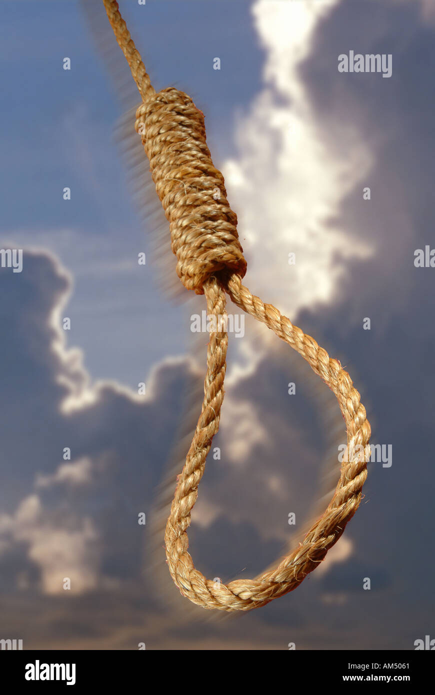 A rope tied into a swinging hangmans noose. Stock Photo