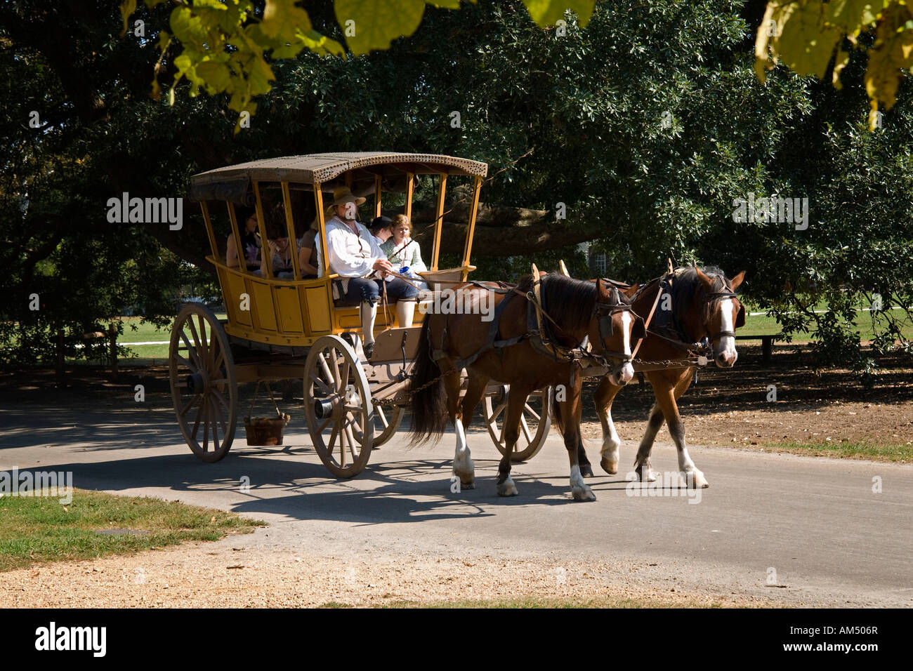 Open air horse drawn carriage ride in Colonial Williamsburg Stock Photo