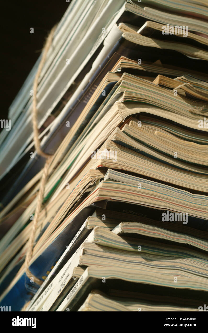 stack of magazines bound and ready to be recycled Stock Photo Alamy