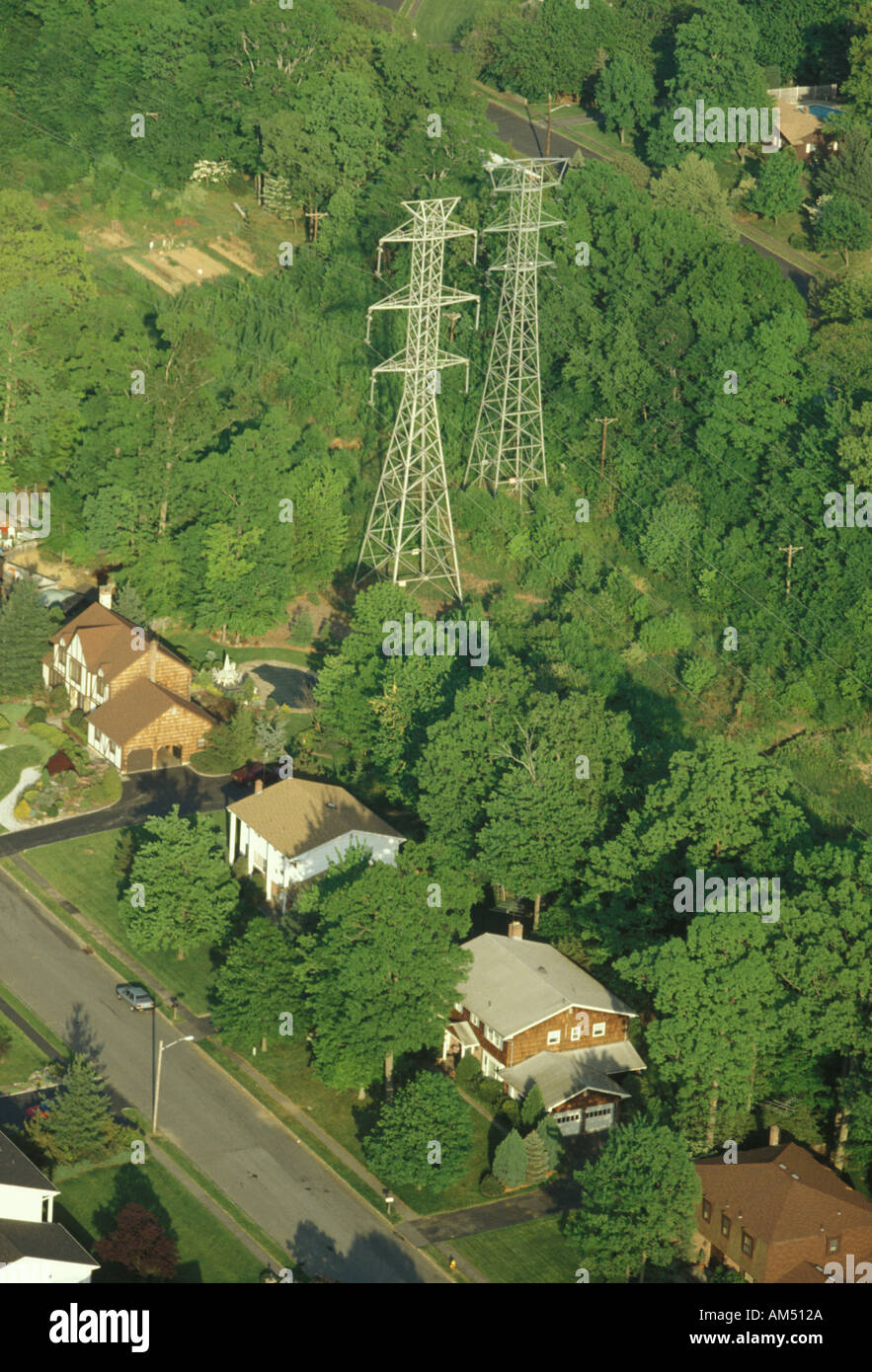 High tension power lines near houses Stock Photo Alamy