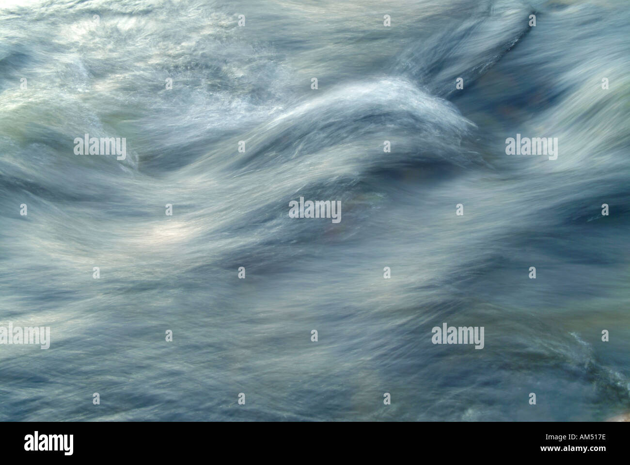 rushing river water close up for backgrounds Stock Photo