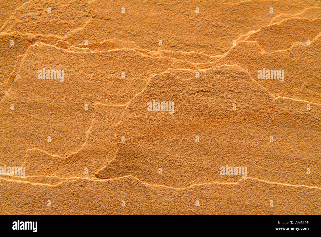 Orange colored layered sandstone background Stock Photo
