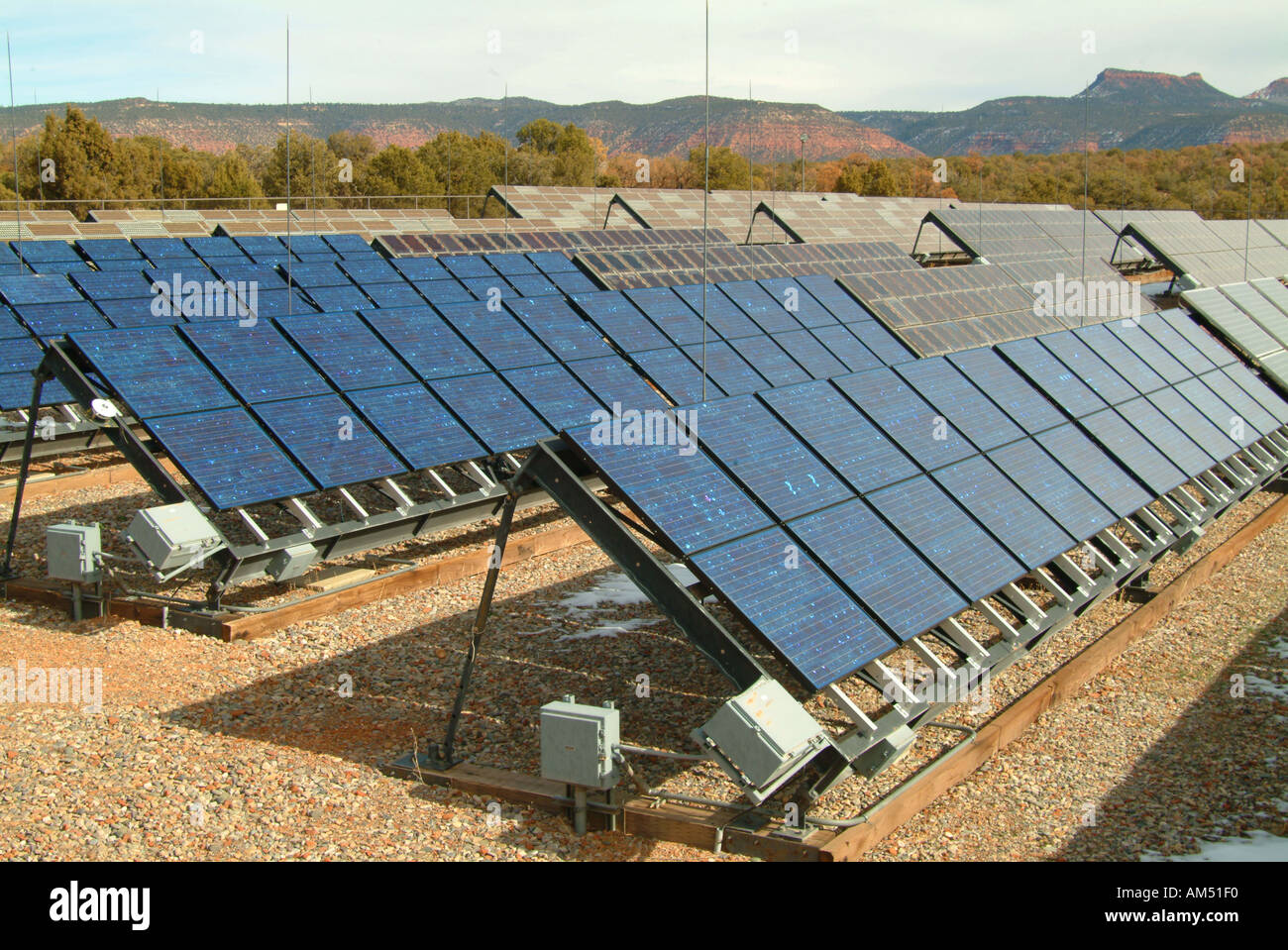 A large array of Photo Voltaic Solar Panels Stock Photo