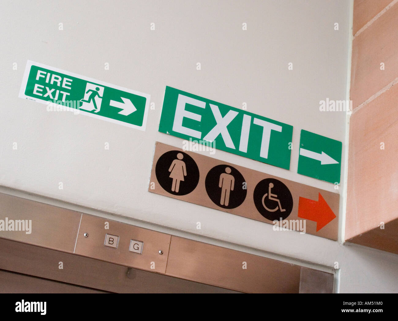 Sign for exit, Fire exit and toilets Stock Photo