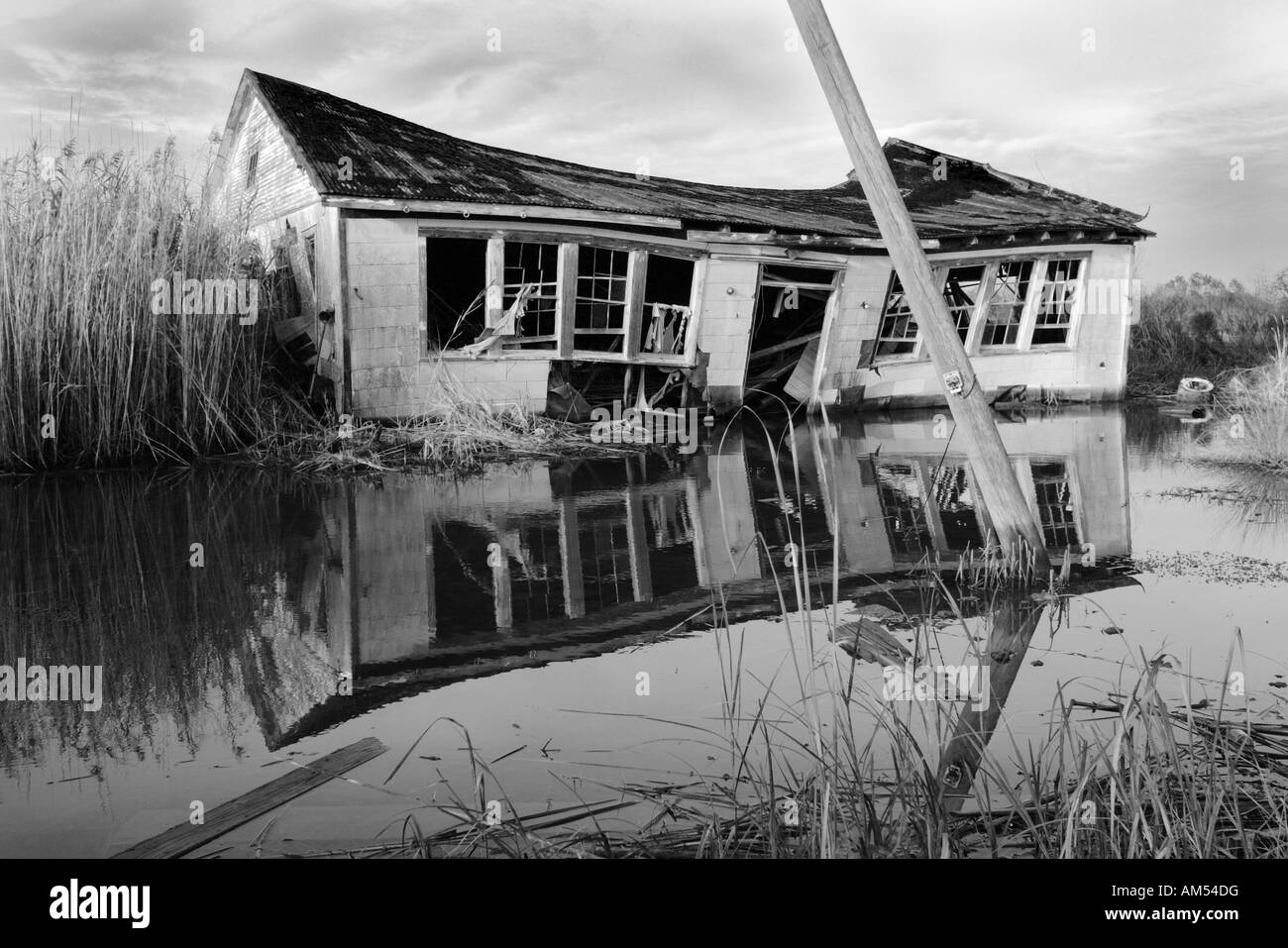 A house destroyed and lifted off its foundation by Hurricane Katrina, located in Irish Bayou, New Orleans, LA. Stock Photo