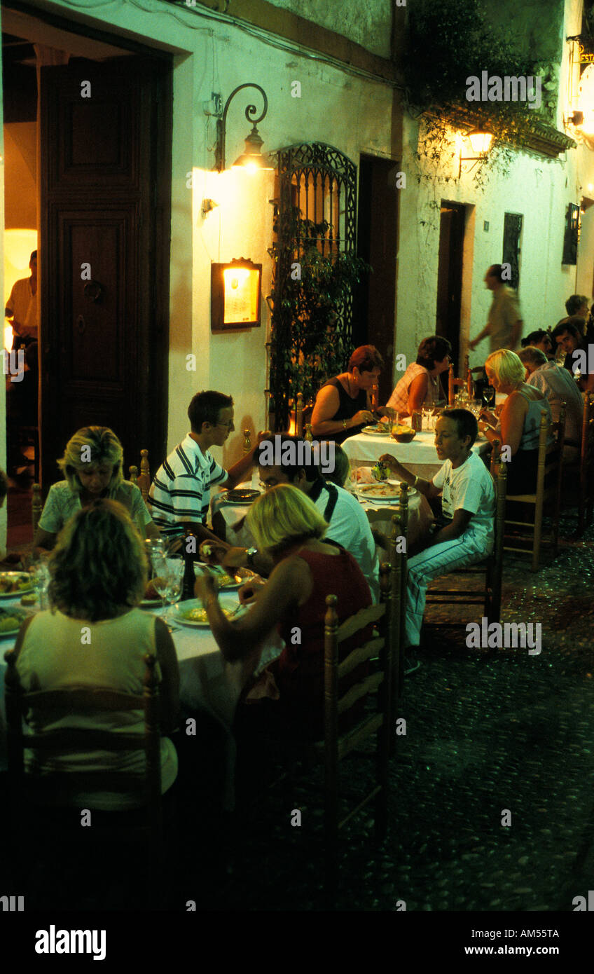 Altea tourists visiting the outdoor terraces Stock Photo