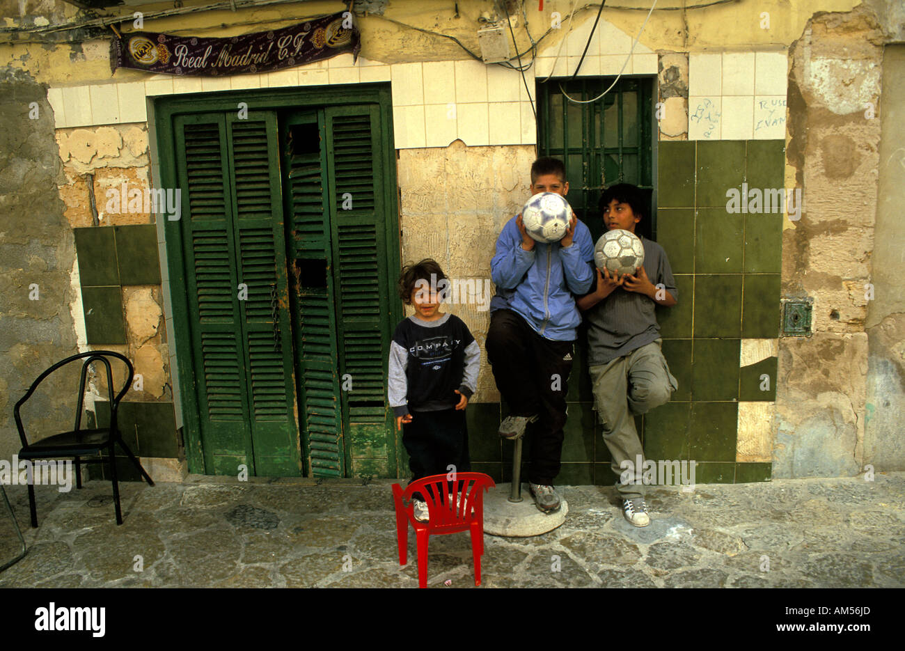 Palma de Mallorca gypsy children in a poor neighbourhood Stock Photo