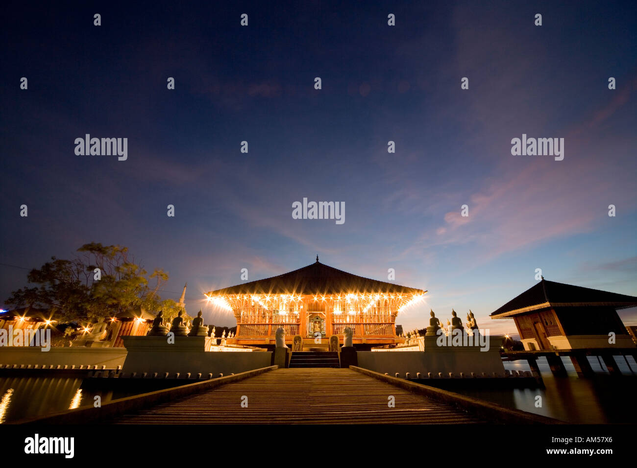 Seema Malakaya, Simamalaka, Buddhist temple in Beira Lake by sir Geoffrey Bawa. Colombo, Sri Lanka at dusk. Stock Photo