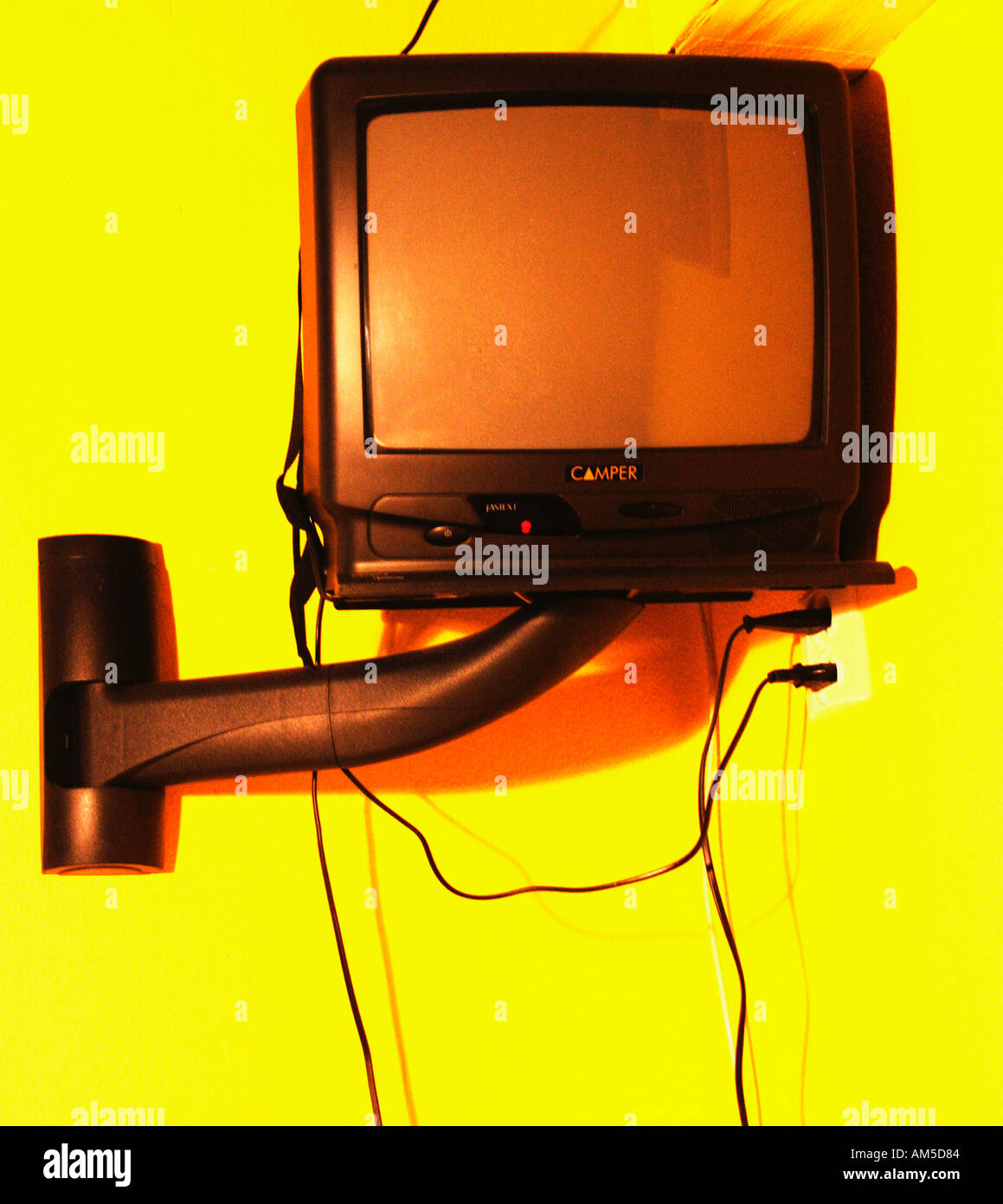 TV television set on wall bracket arm Stock Photo