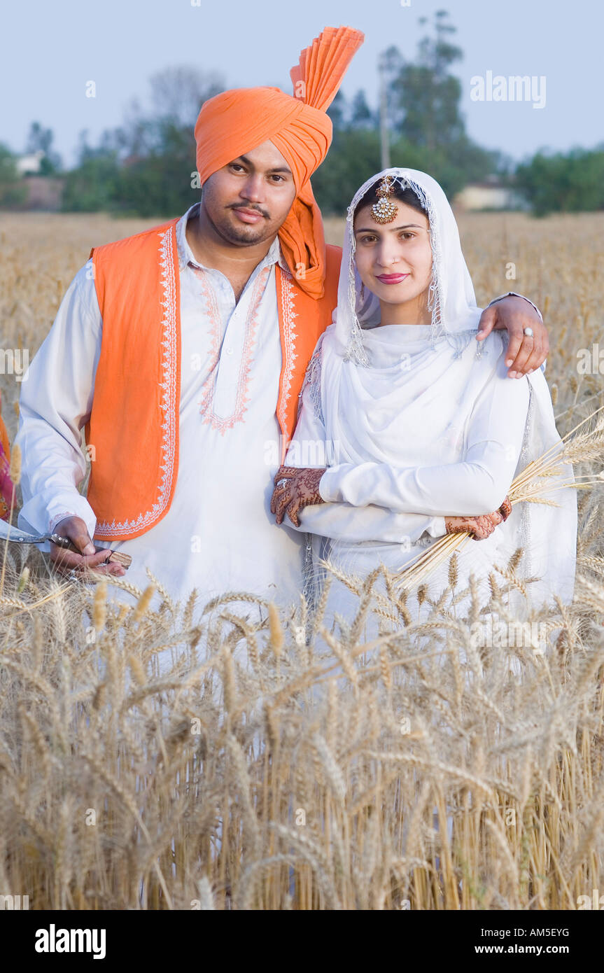 Rural Indian couple in agricultural field Stock Photo - Alamy