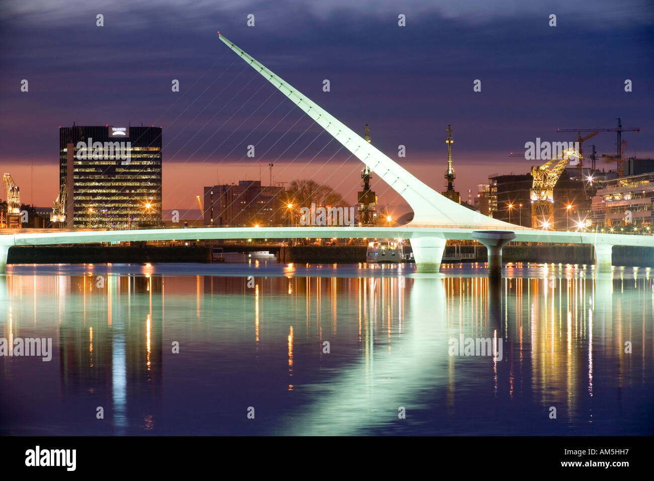 Puente de la Mujer bridge, Puerto Madero, Buenos Aires, at dusk. Argentina. Architect: Santiago Calatrava. Stock Photo