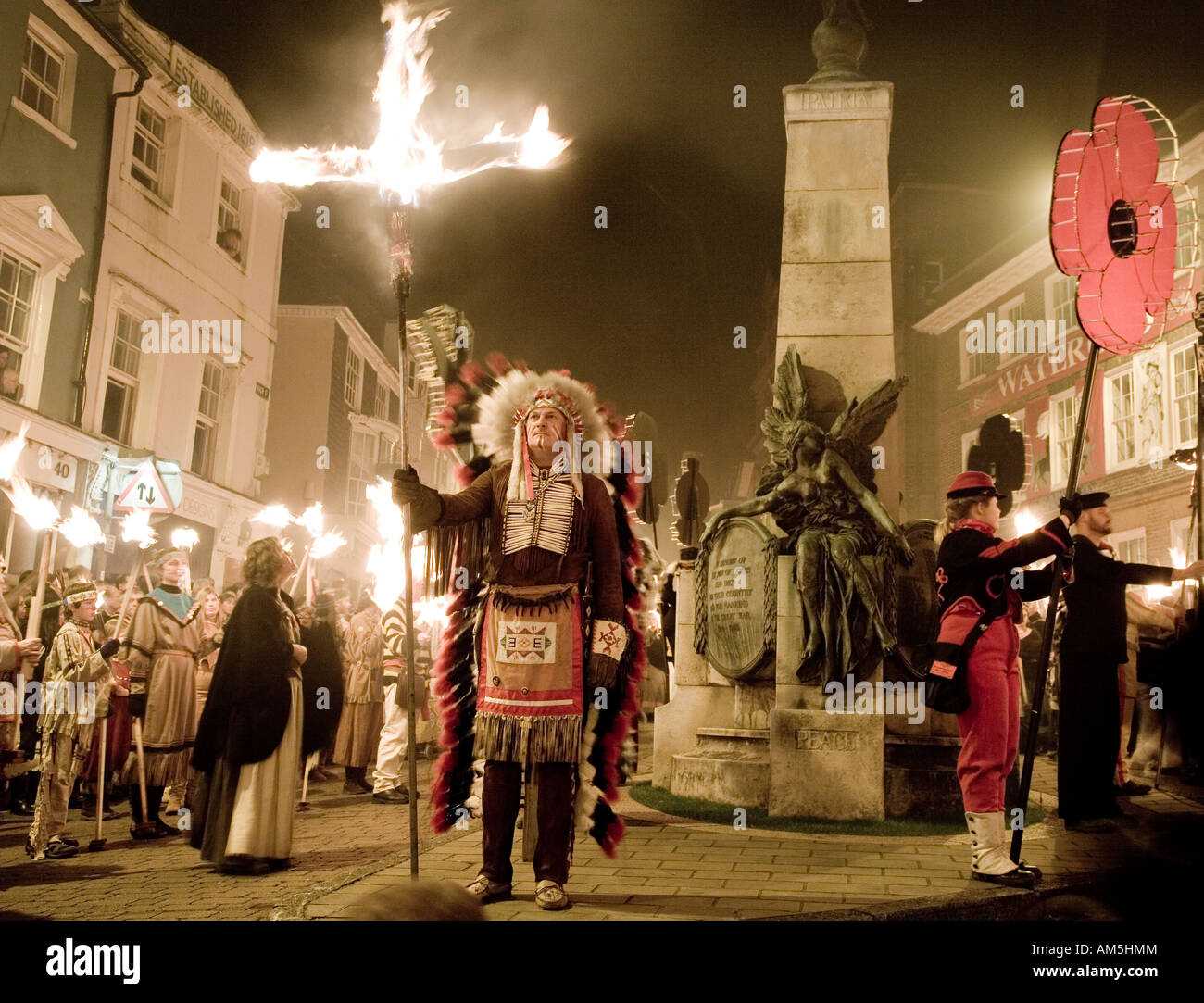 Red Indian Chief Burning Crosses Torchlight procession At The Lewes Fire Festival Sussex UK Europe Stock Photo