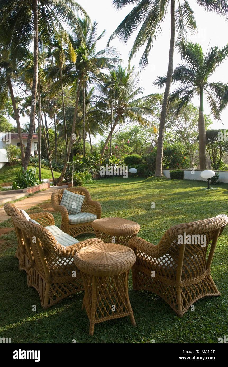 Armchairs and a couch in a lawn Stock Photo Alamy