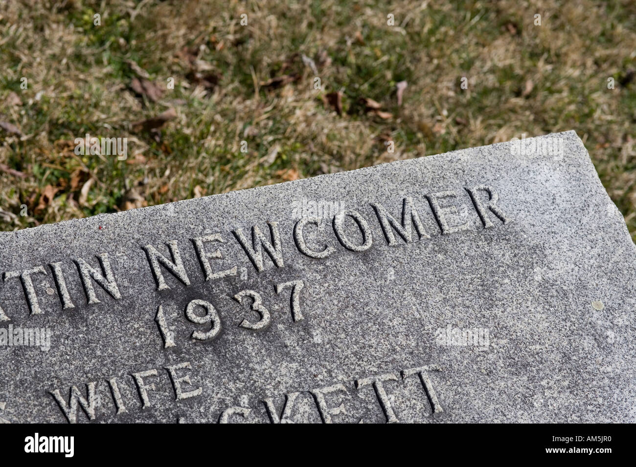 The headstone of someone of immigrant descent called Newcomer. Stock Photo